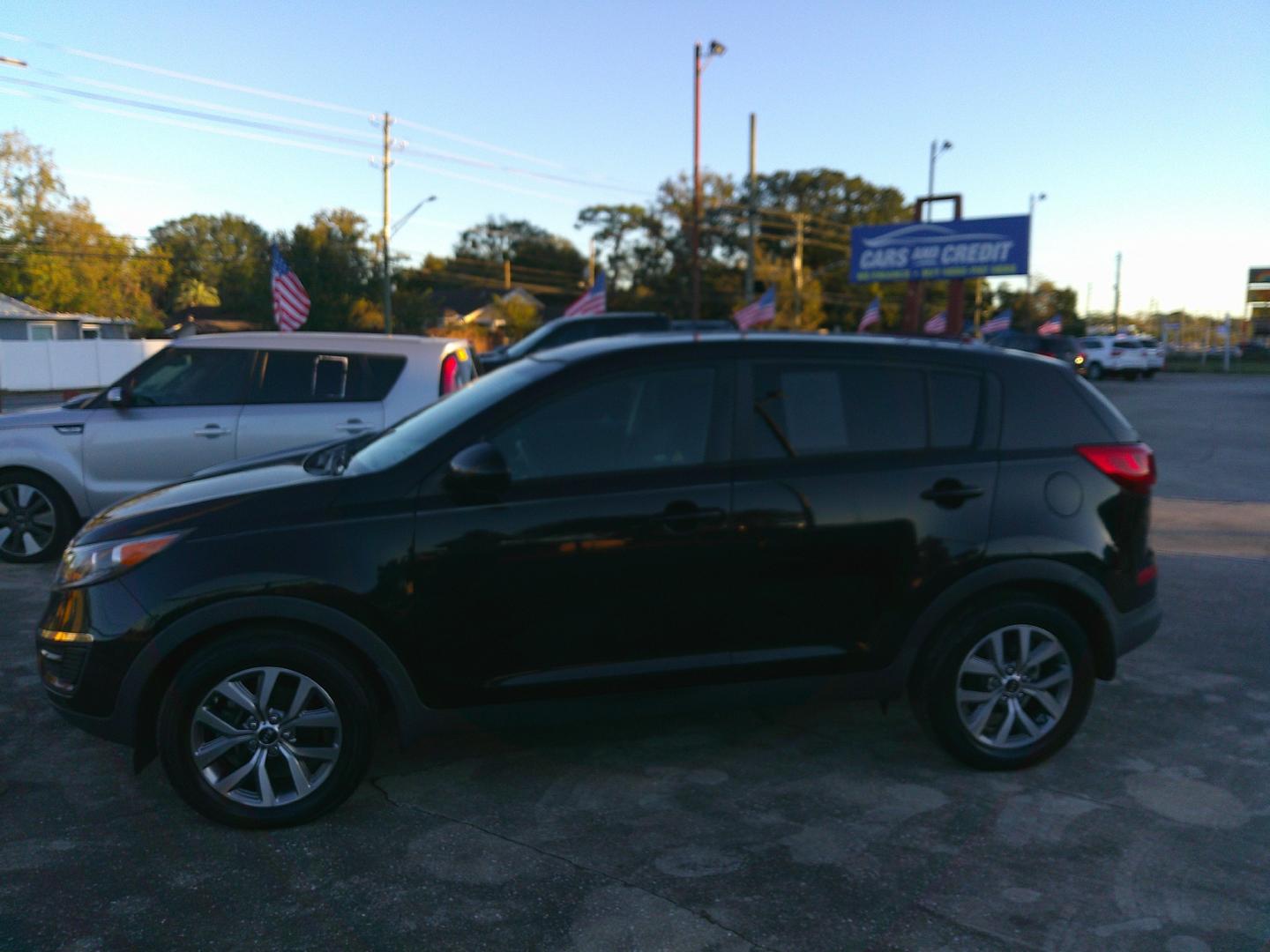 2016 BLACK KIA SPORTAGE EX; LX (KNDPB3AC6G7) , located at 10405 Abercorn Street, Savannah, GA, 31419, (912) 921-8965, 31.988262, -81.131760 - Photo#1